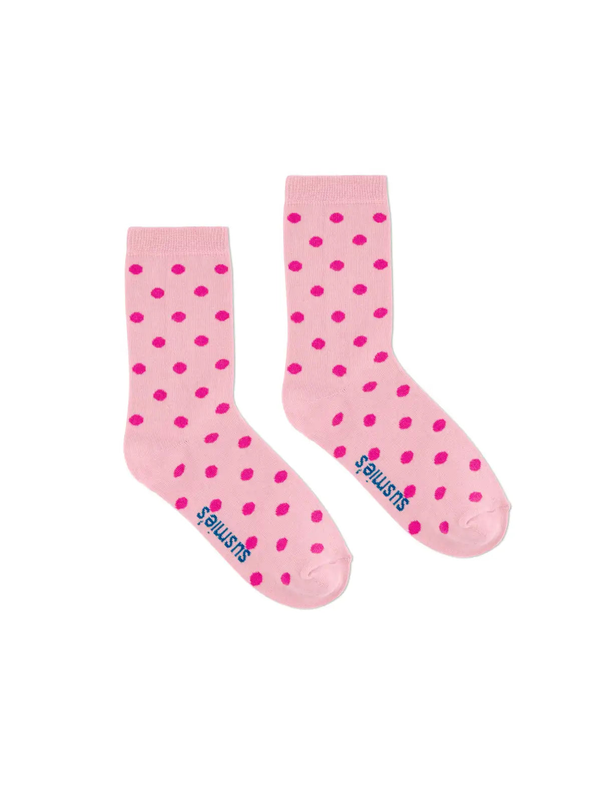 Pink polka dot socks with bright pink dots and blue Slugtribe branding on the sole