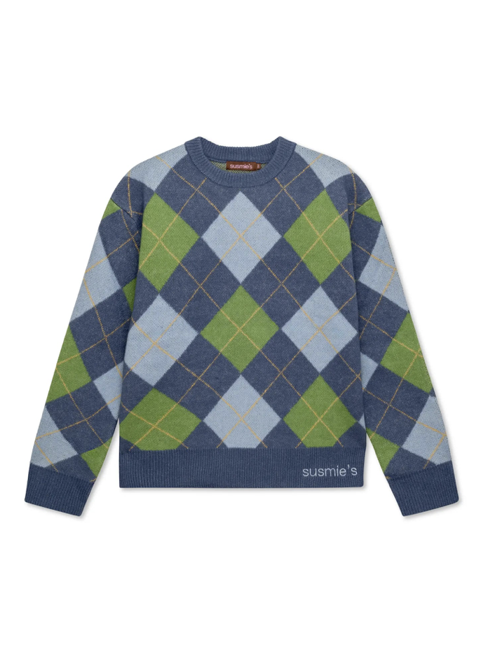 Blue argyle knit sweater with light blue and green diamond pattern and orange accent stitching