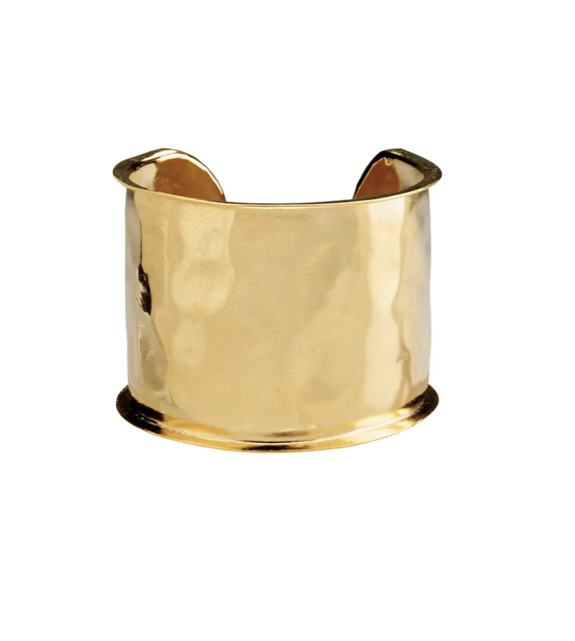 Wide hammered gold cuff bracelet with open back and polished finish