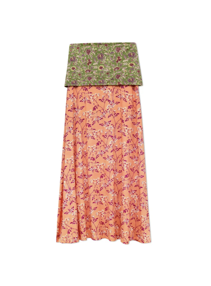 Green and orange floral print reversible midi skirt with contrasting patterns on each side