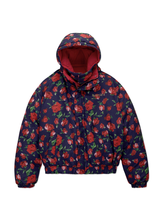 Navy blue puffer jacket with red floral print pattern and pink hood lining, hooded style with front zip closure