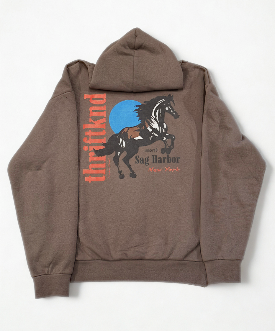 Brown hoodie with Sag Harbor New York horse graphic print on front, laid flat on white background