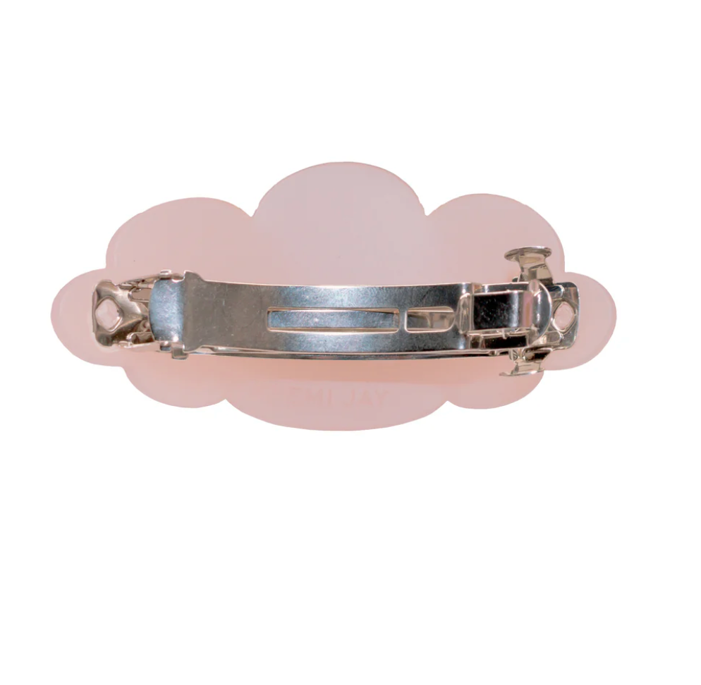 Cloud-shaped pink acrylic hair barrette with silver metal clasp, shown from back view
