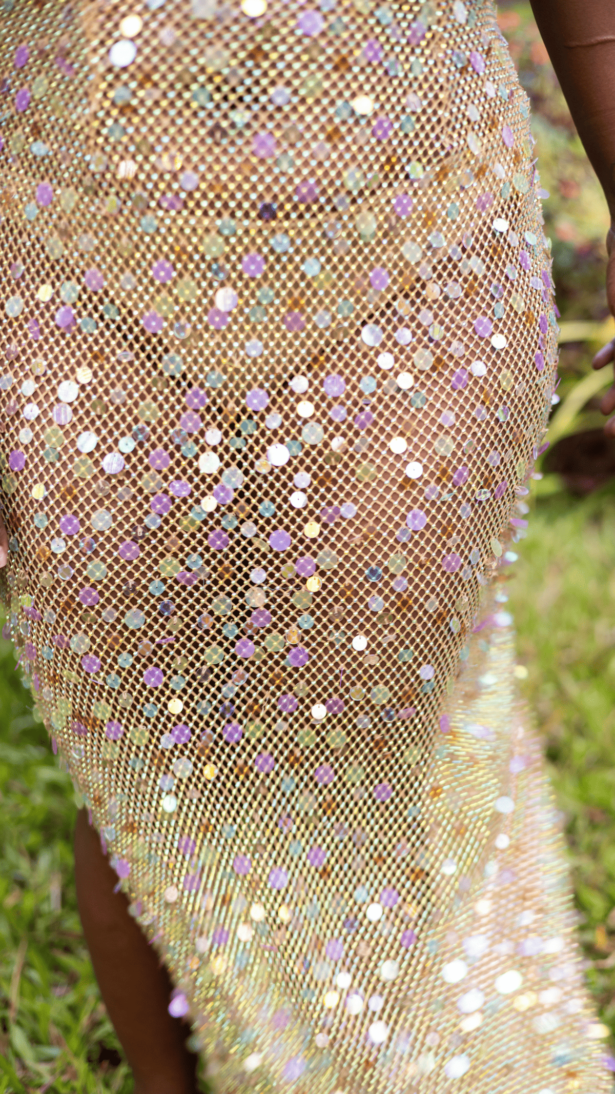 Gold mesh sequin skirt with iridescent purple and white sequins, fitted bodycon style