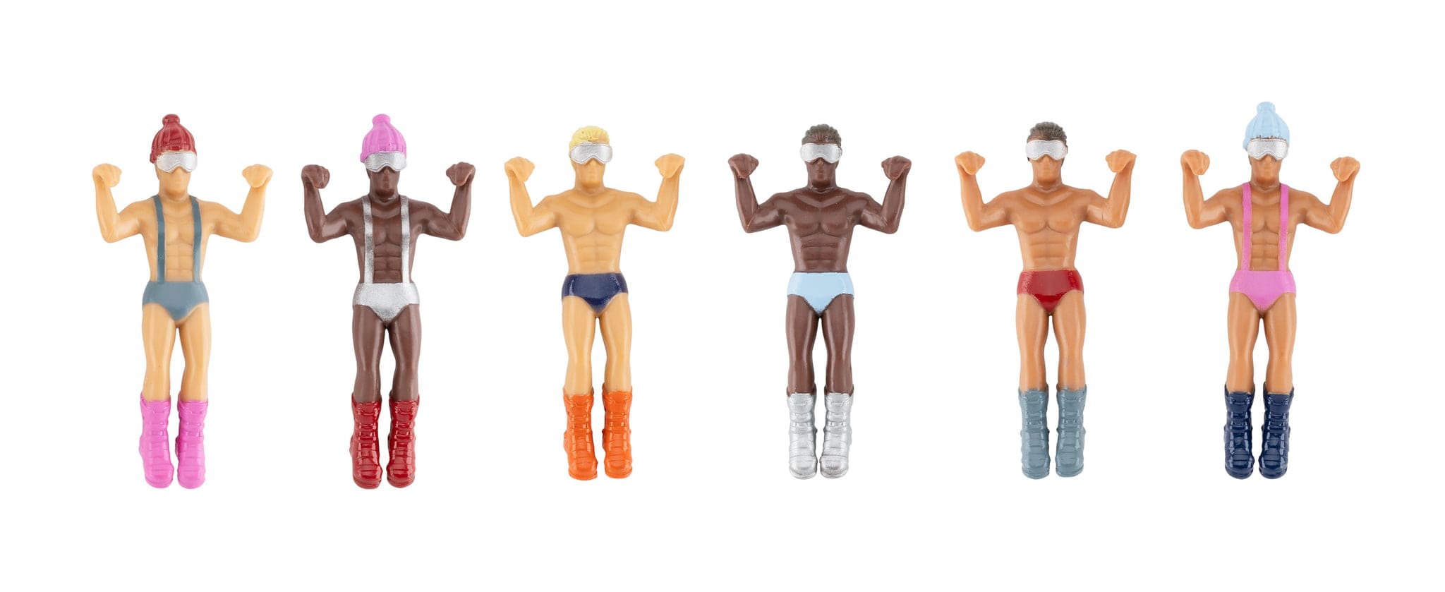 Six muscular figure toys with ski goggles and boots in various skin tones, wearing colorful swimwear and winter accessories