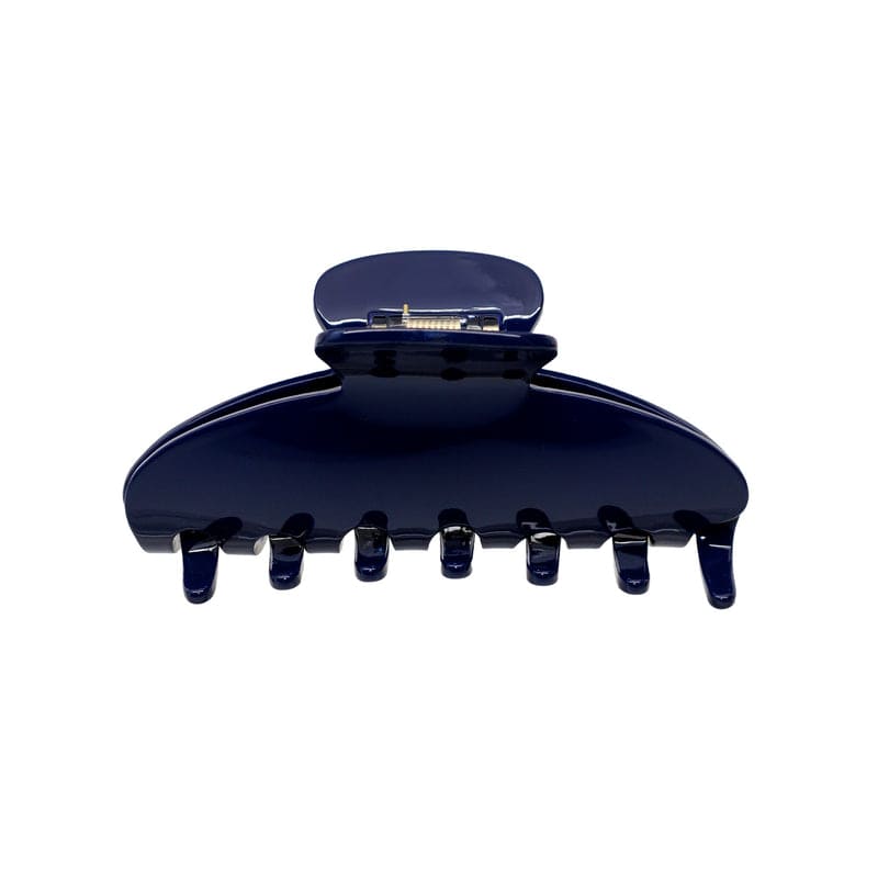 Navy blue plastic hair claw clip with metal clasp mechanism and curved teeth for securing hair