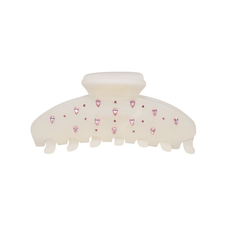 Cream colored hair claw clip with pink crystal embellishments in teardrop and round shapes