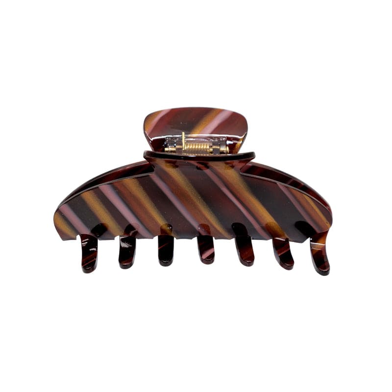 Large tortoiseshell hair claw clip with brown and amber striped pattern and metal clasp closure