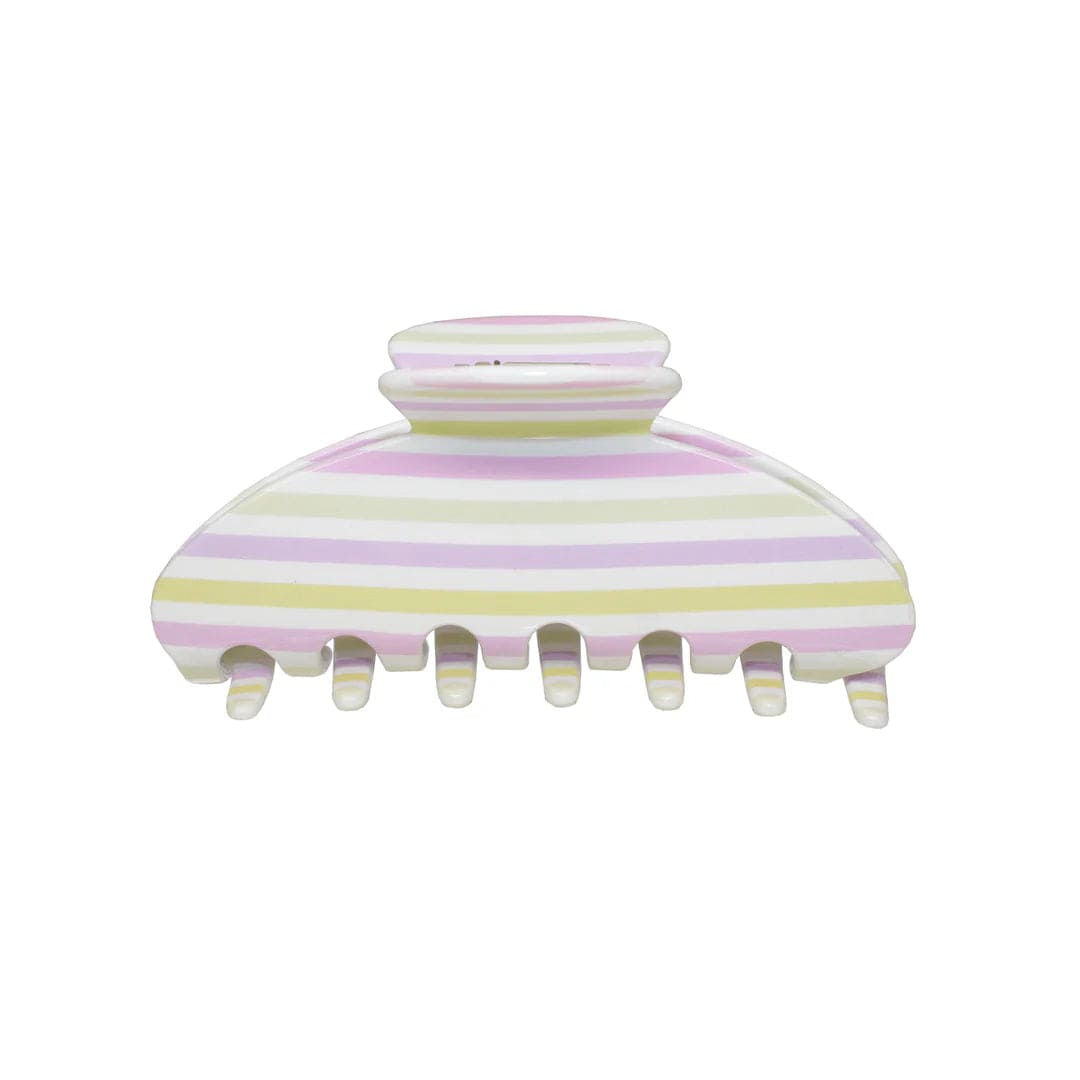 Striped hair claw clip in pastel pink, yellow, and white with seven teeth and dome-shaped top