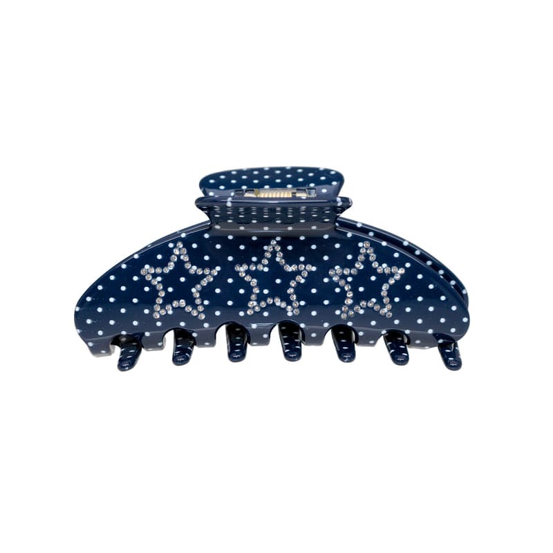 Navy blue polka dot hair claw clip with rhinestone embellishment and multiple teeth clasps