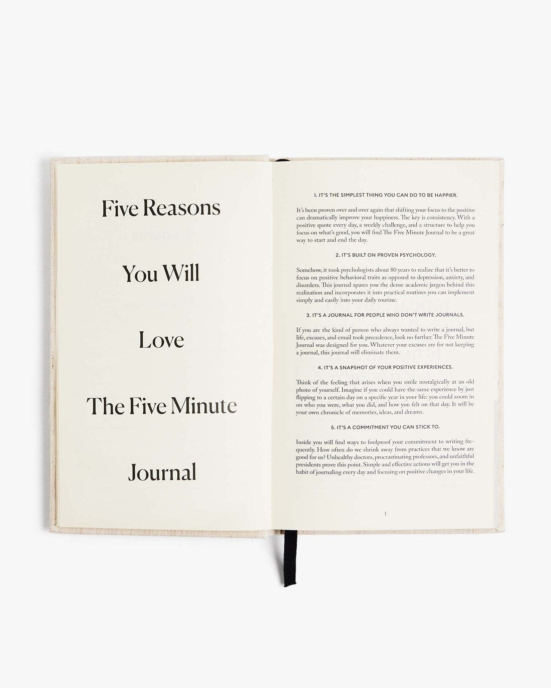 Open cream-colored journal showing title page "Five Reasons You Will Love The Five Minute Journal" and introduction text on facing page