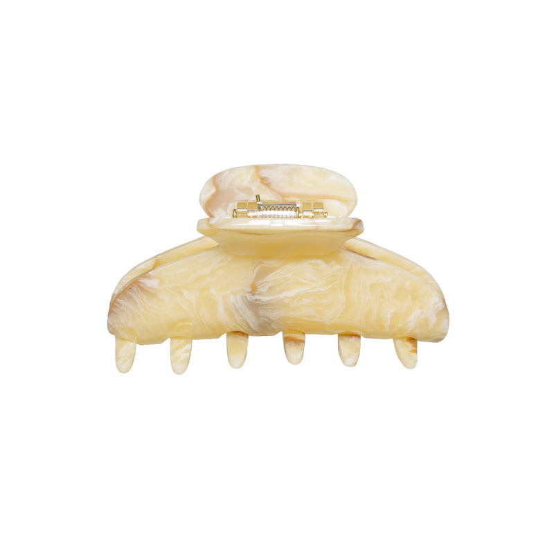 Large yellow marbled resin hair claw clip with gold-tone metal clasp and six curved teeth for securing hair