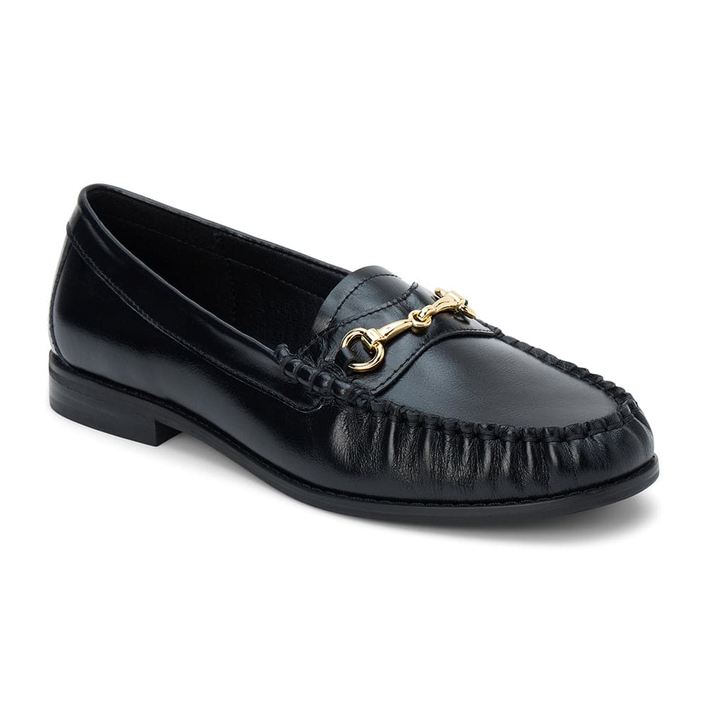 Black leather moccasin loafer with gold horsebit hardware and hand-stitched details on white background