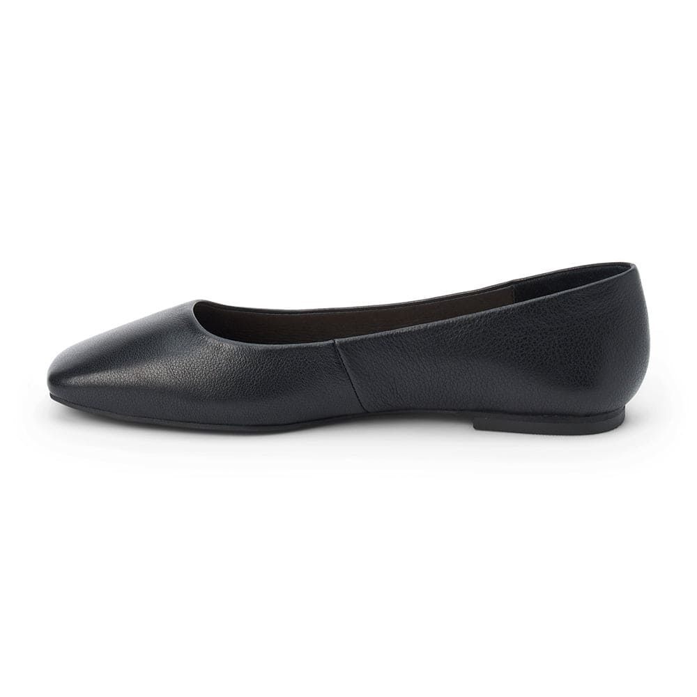 Black leather ballet flat with rounded toe and low profile heel, shown from side view