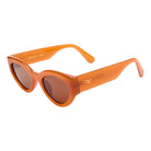 Orange sunglasses with a brand logo on a white background