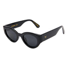 Black sunglasses with gold accents on a white background
