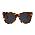Tortoiseshell cat-eye sunglasses on a white background