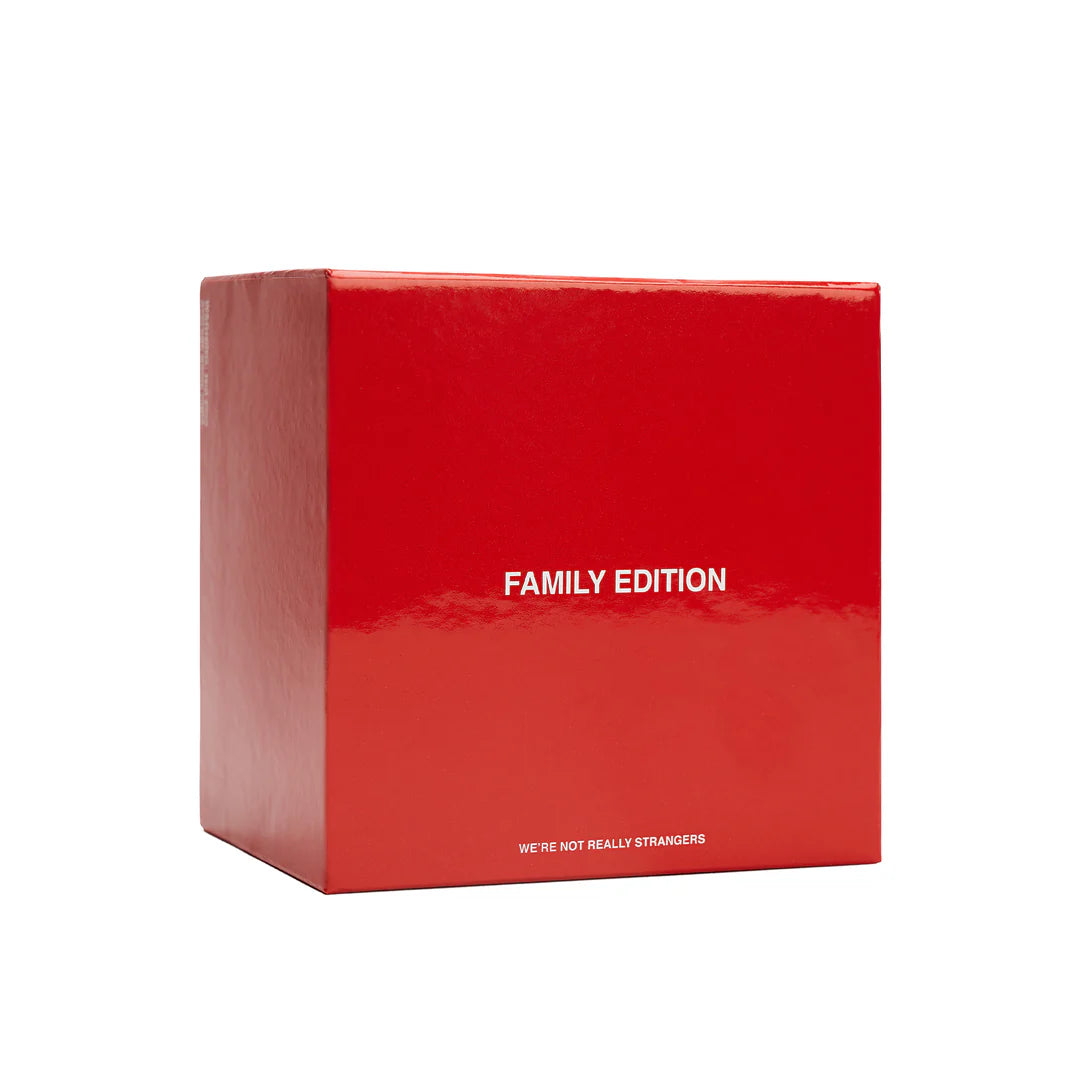 Red cardboard box labeled Family Edition with text We're Not Really Strangers at bottom, shown at an angle against white background