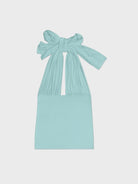 Light blue ribbed knit halter top with oversized bow tie detail at neckline