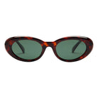 Sunglasses with tortoiseshell frame and green lenses on a white background
