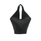 Black woven handbag on a white background