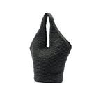 Black woven handbag on a white background