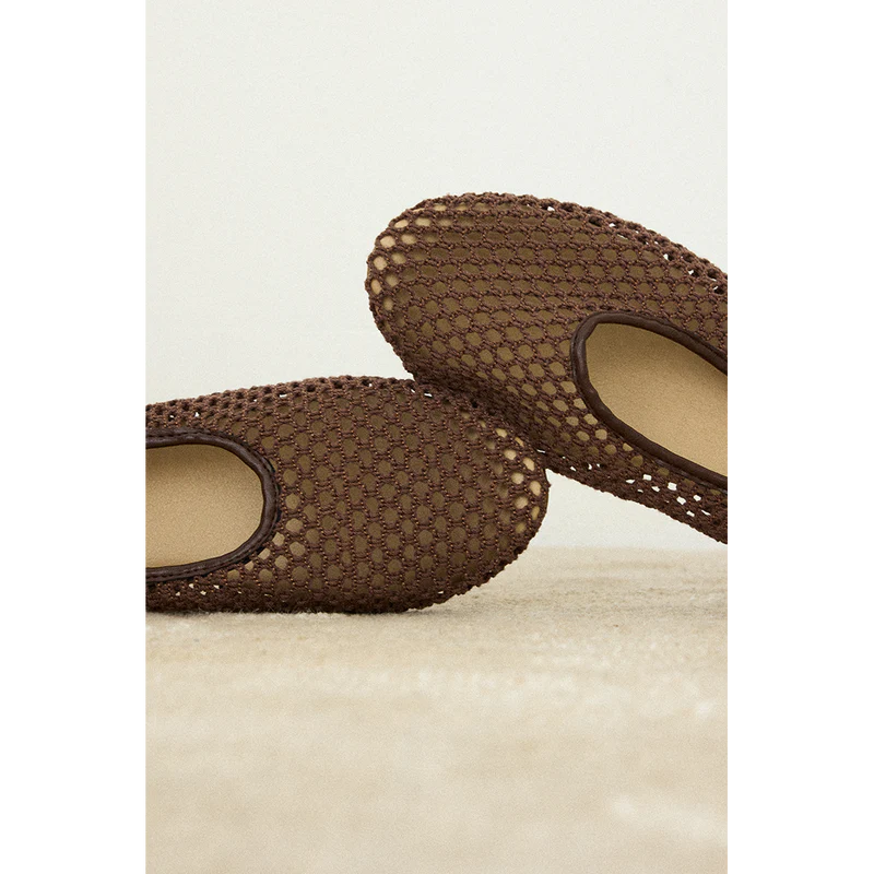 Brown woven mesh ballet flats with rounded toe and beige insole, shown from above