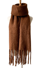 Brown textured knit scarf with fringe tassels displayed on white mannequin bust against white background