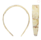 Cream marbled resin headband with teeth, shown from front and side view