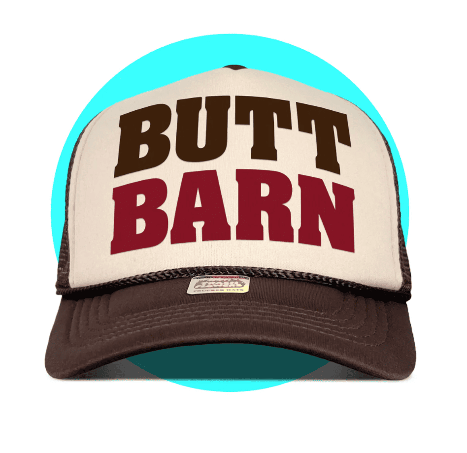 Brown and beige mesh trucker hat with BUTT BARN text in brown and maroon lettering on white front panel
