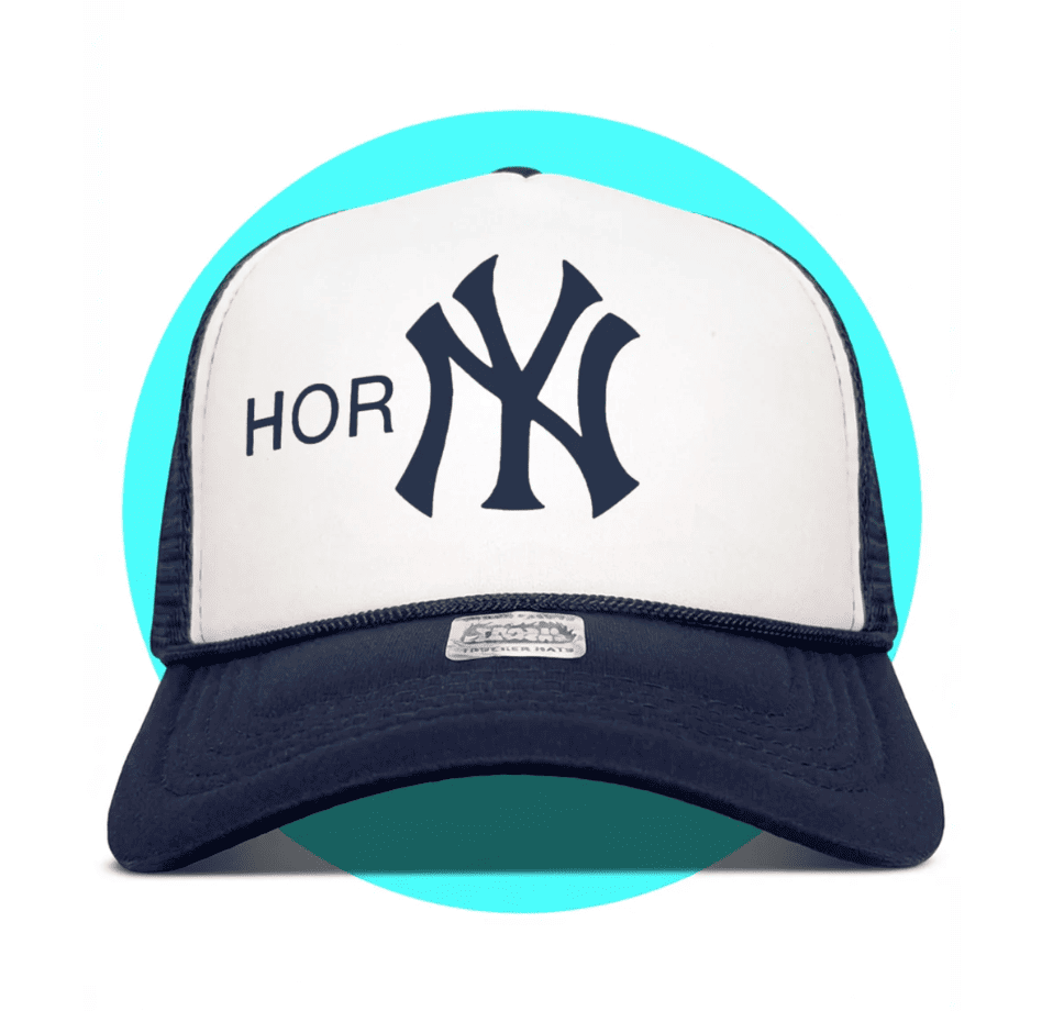 Navy blue and white New York Yankees trucker hat with mesh back panels and turquoise accent trim on crown