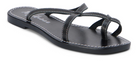 Black leather strappy sandal with white contrast stitching and adjustable ankle strap on flat sole