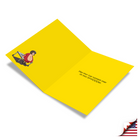 Bright yellow birthday card featuring cartoon wrestler illustration and text reading "May your Guo runneth over on your birth-DDDay"