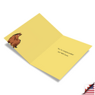 Yellow greeting card with brown gruffalo character illustration and text reading "You're irreplaceable! Get Well Soon"