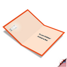Open birthday card with orange border, peach interior, shot glass image with radiating lines, and text "It's your birthday! I'll drink to that."