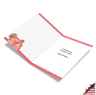 Barbie-themed birthday card with pink patterned border, featuring dolls on left side and celebratory text inside