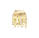 Beige marbled resin hair claw clip with four teeth and curved shape against white background
