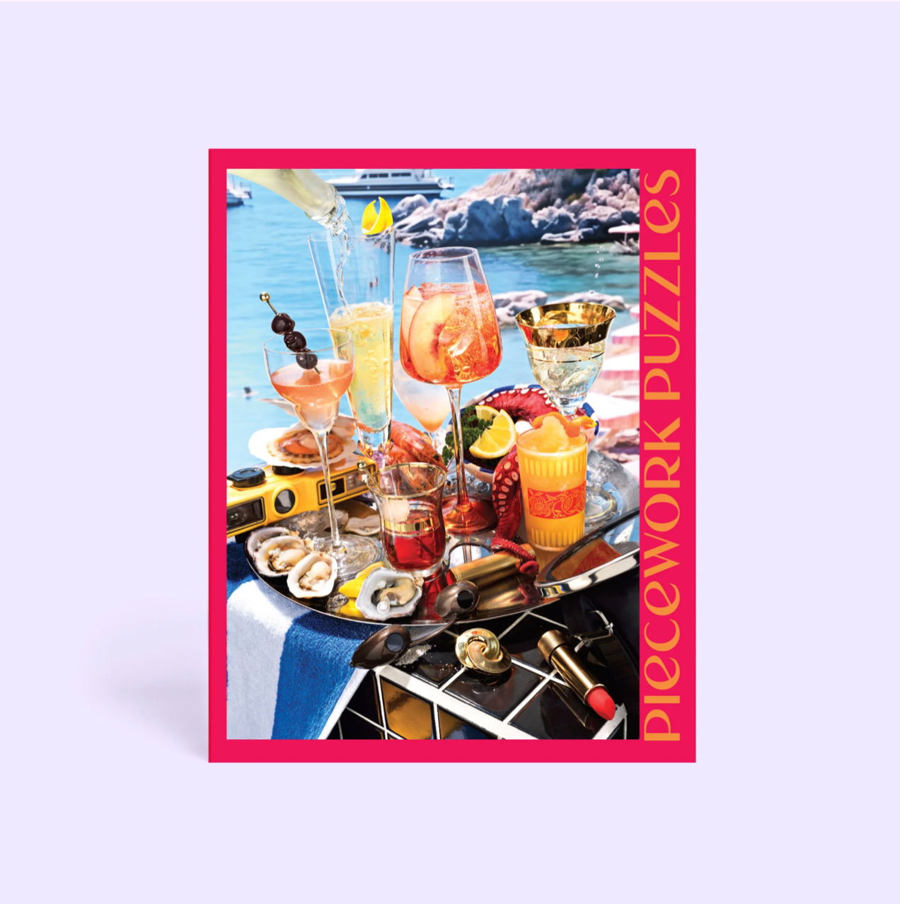 Colorful jigsaw puzzle featuring luxury cocktails and appetizers on a seaside setting with pink border and gold text