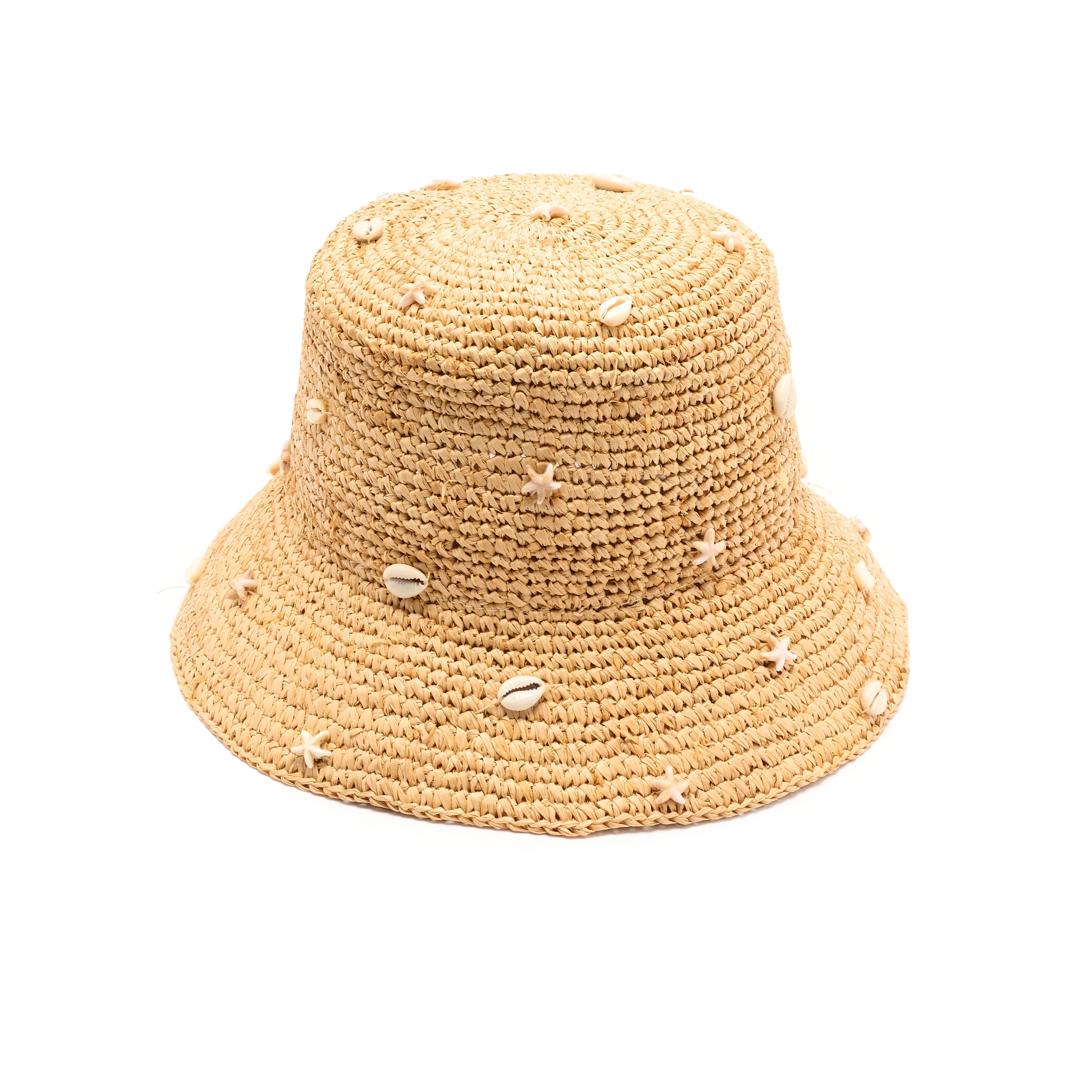 Beige straw bucket hat with shell embellishments on a white background