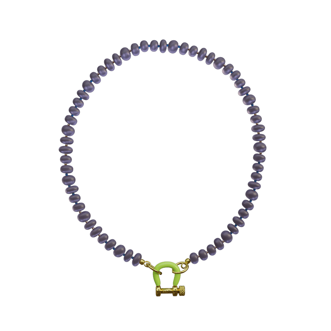Dark purple beaded bracelet with lime green geometric toggle clasp and gold accents