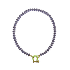 Dark purple beaded bracelet with lime green geometric toggle clasp and gold accents