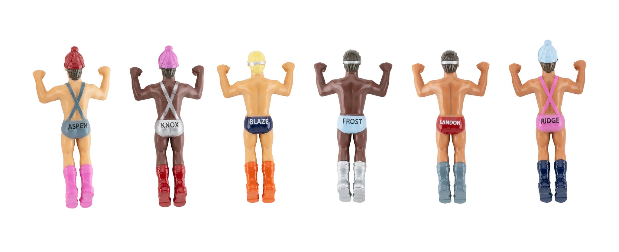 Six muscular wrestler action figures shown from behind, wearing colorful boots and wrestling singlets with names on them