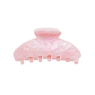 Pink marbled acrylic hair claw clip with teeth grips for securing hair in place
