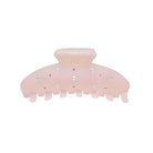 Pink frosted acrylic hair claw clip with clear and pink crystal embellishments and curved teeth design