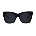 Black sunglasses with dark lenses on a white background