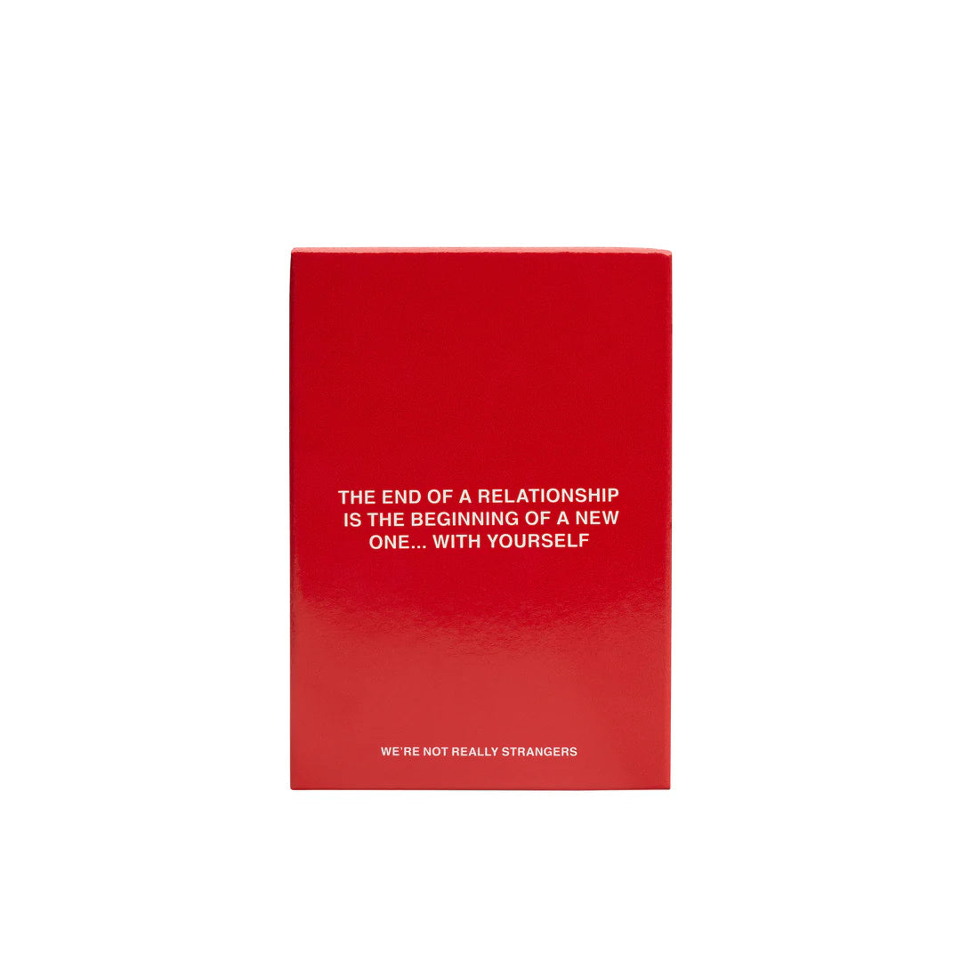Red velvet journal with white text reading "The end of a relationship is the beginning of a new one... with yourself"