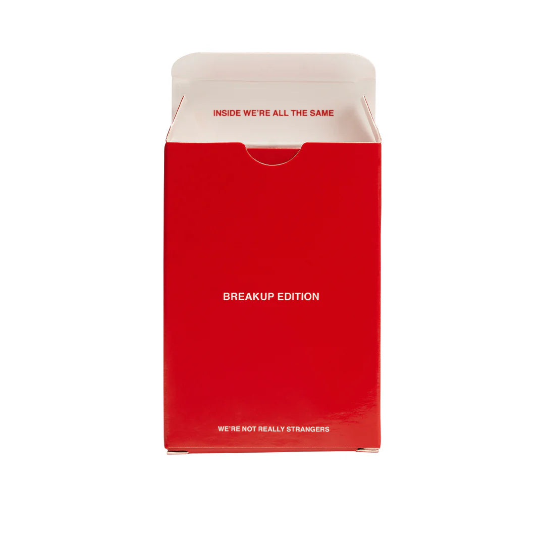 Red cardboard box with white interior flap displaying text "INSIDE WE'RE ALL THE SAME" and "BREAKUP EDITION" on front