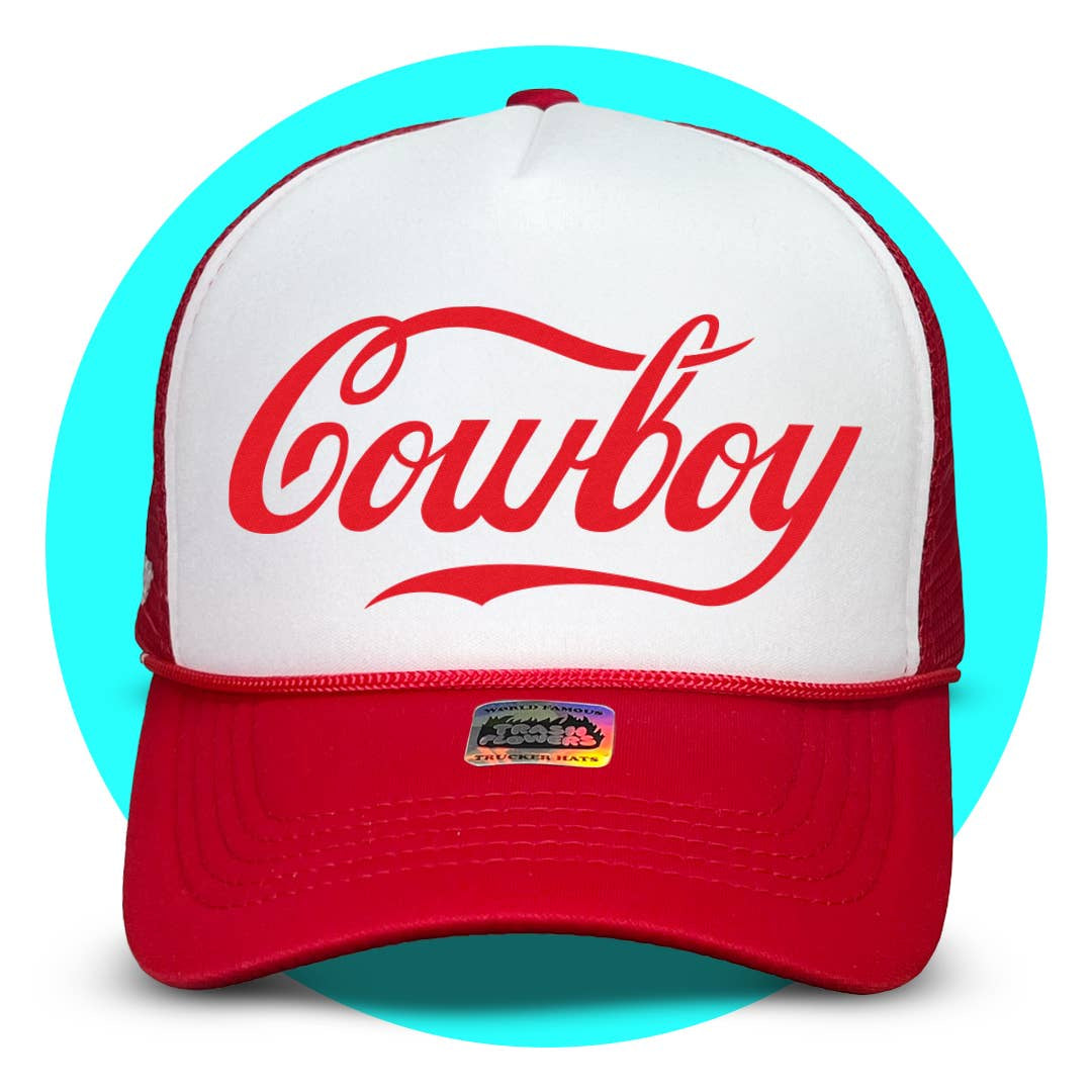 Red and white mesh trucker hat with "Cowboy" script logo in red lettering on white foam front panel
