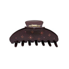 Large brown hair claw clip with pink rhinestone star pattern decorations and metal clasp closure