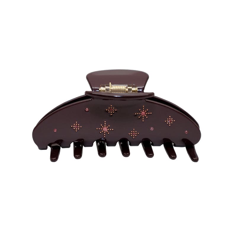 Large brown hair claw clip with pink rhinestone star pattern decorations and metal clasp closure